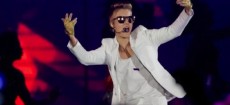 Canadian singer Justin Bieber performs during his concert as part of the Believe Tour at Telenor Arena in Fornebu, Norway on April 16, 2013. (AFP)