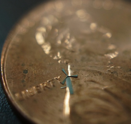 A micro-windmill and penny