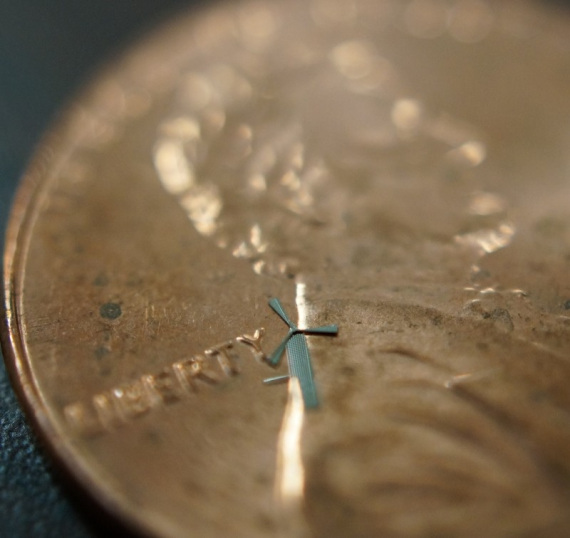 One of Rao's micro-windmills is placed here on a penny. Image Credit: University of Texas during Arlington